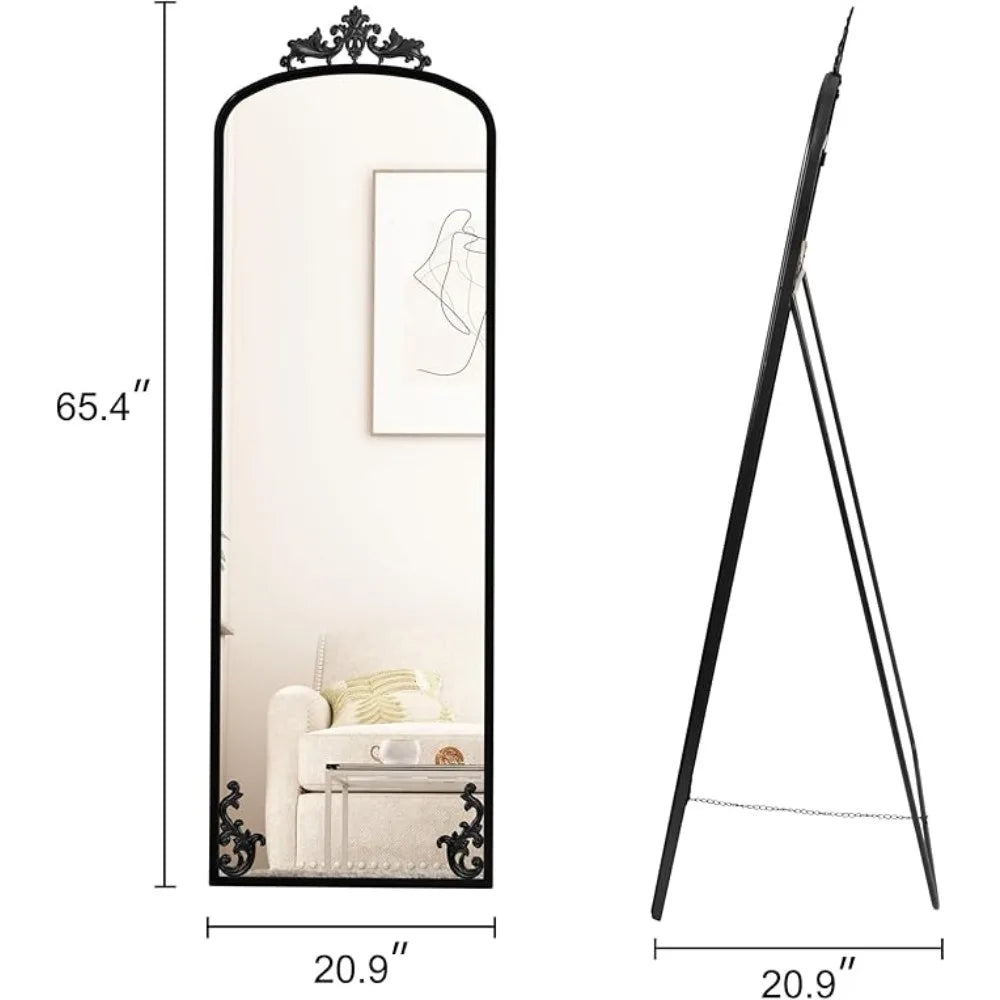 Arched full-length mirror with carved metal frame